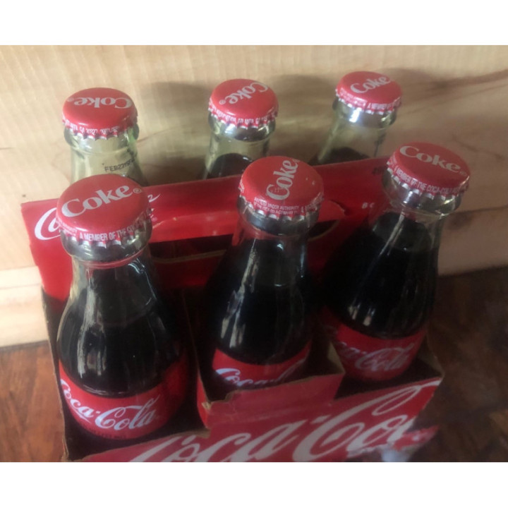 Canasta Coca-Cola 237 ML Six Pack - Usa 2010 reverso